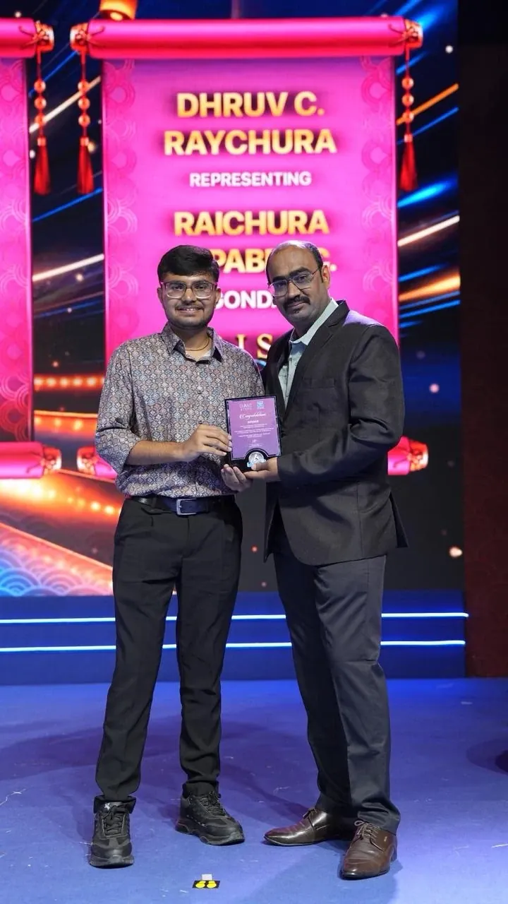 Dhruv C. Raychura receiving professional recognition