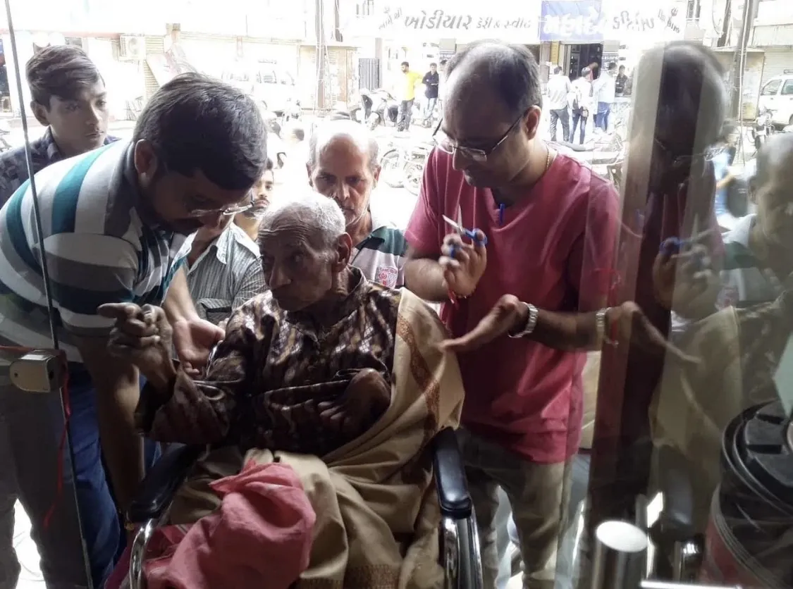 Pravinchandra A. Raychura with a client during the business's earlier years